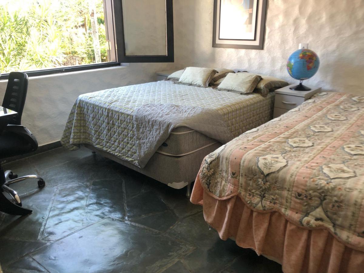 Casa de hóspedes Castelinho Enseada 05 Suites Ubatuba