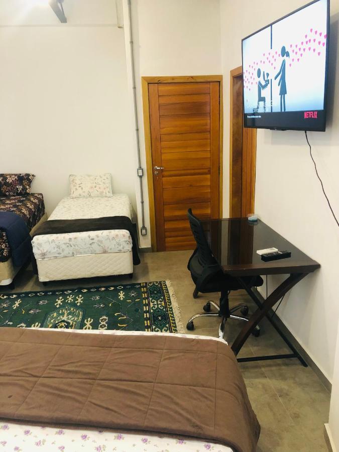 Casa de hóspedes Castelinho Enseada 05 Suites